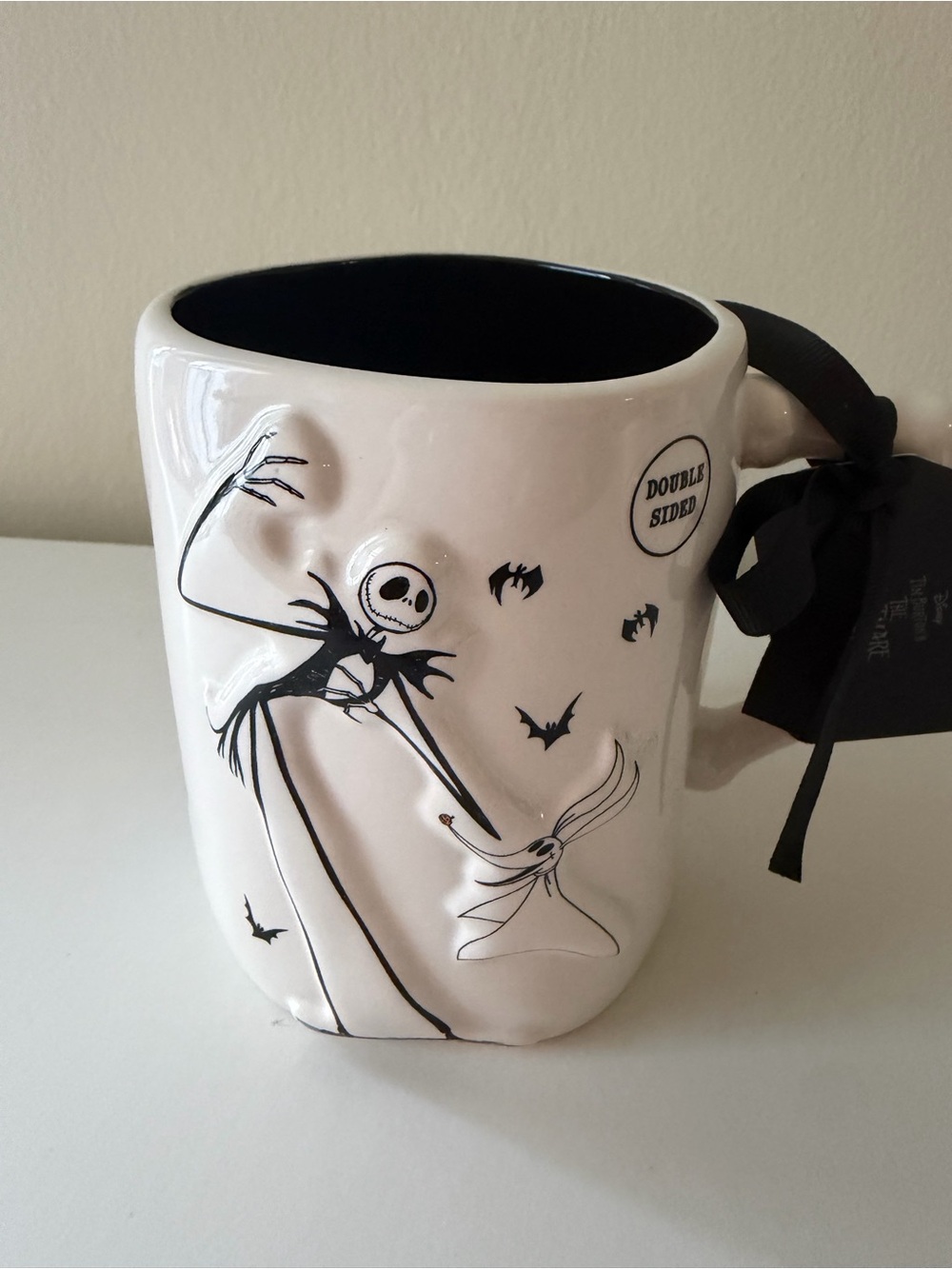 Rae Dunn White Ceramic Mug with Black Interior and Artwork